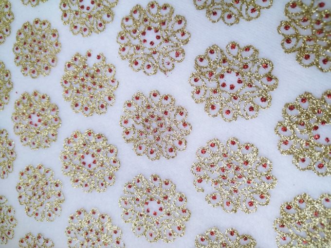 Tela polar (fleece) Navidad beige con figuras doradas