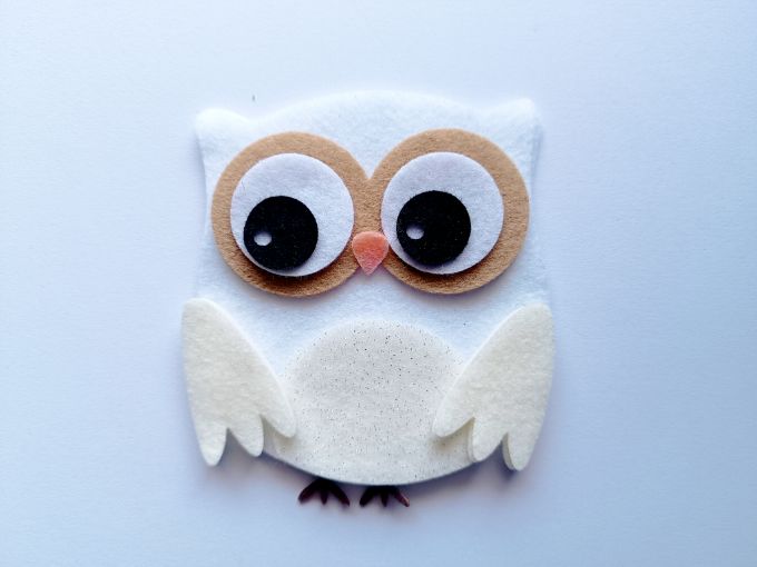 Búho troquelado blanco